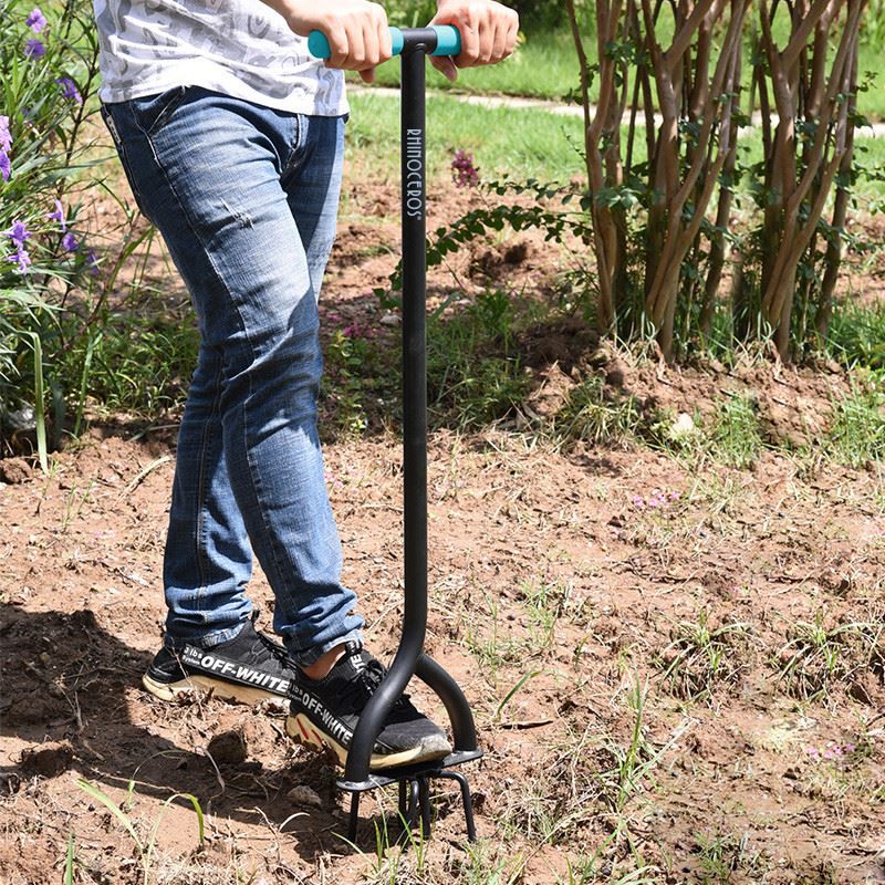 Long handled garden claw operation